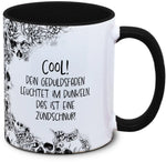 Tasse Totenkopf und Spruch: "Cool! Dein Geduldsfaden leuchtet im Dunkeln. Das ist eine Zündschnur!"