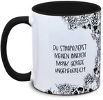 Tasse Totenkopf und Spruch: "Du strapazierst meinen inneren Monk gerade ungeheuerlich!"